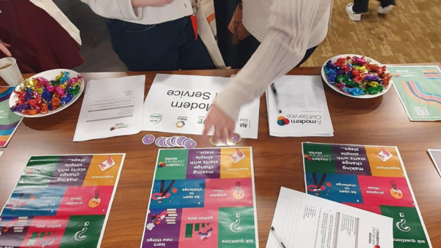 A stand showing 7 habits of change documents at the policy event in Sheffield, February 2024.